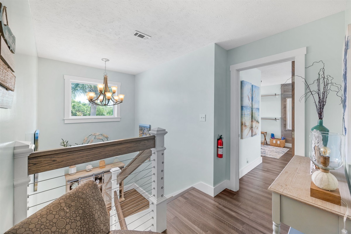 Stairs leading to 3 bedrooms upstairs. 