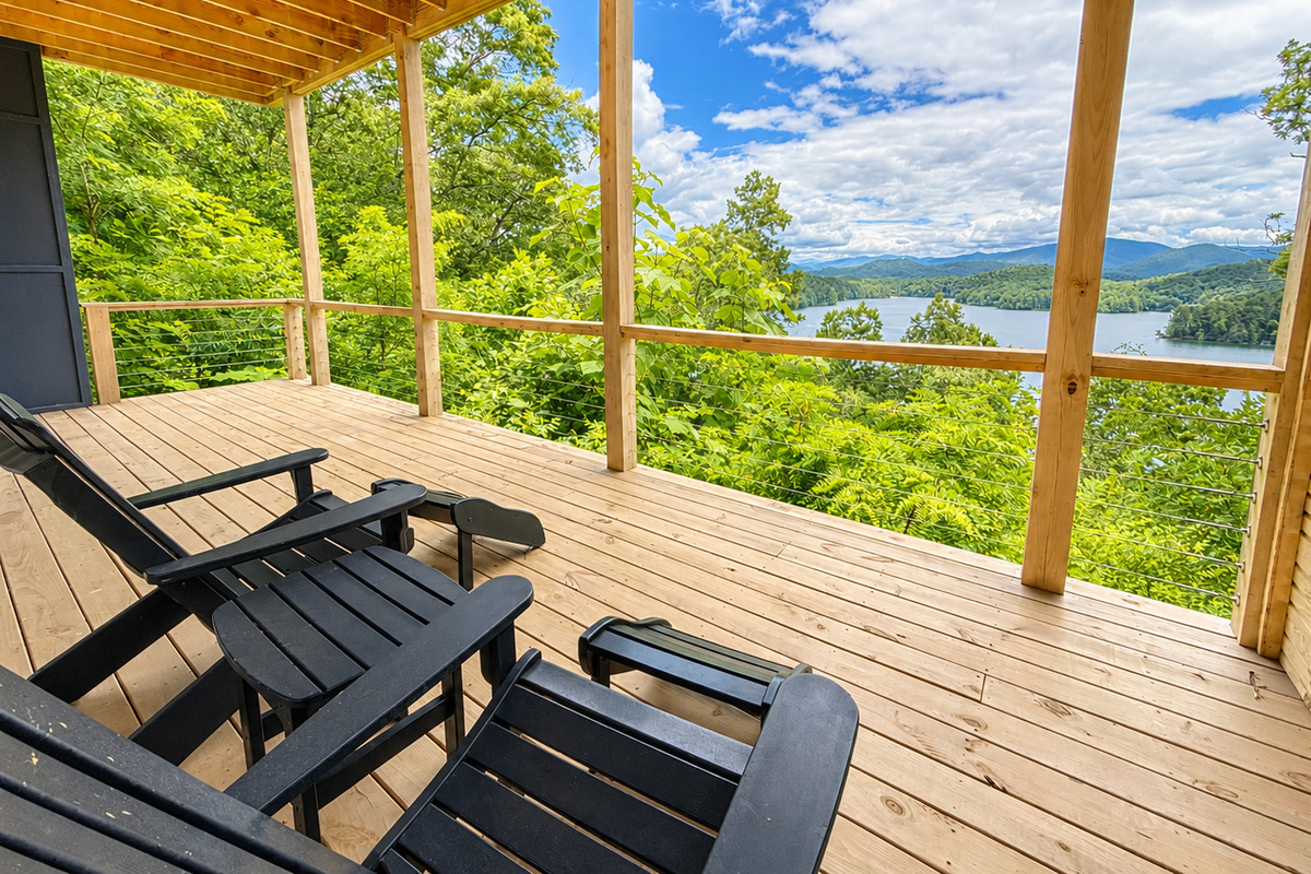 Your favorite seat in the house might be outside.
Relax in an Adirondack chair, enjoy the shade provided by the upper deck, and watch the scenery change throughout the day.
