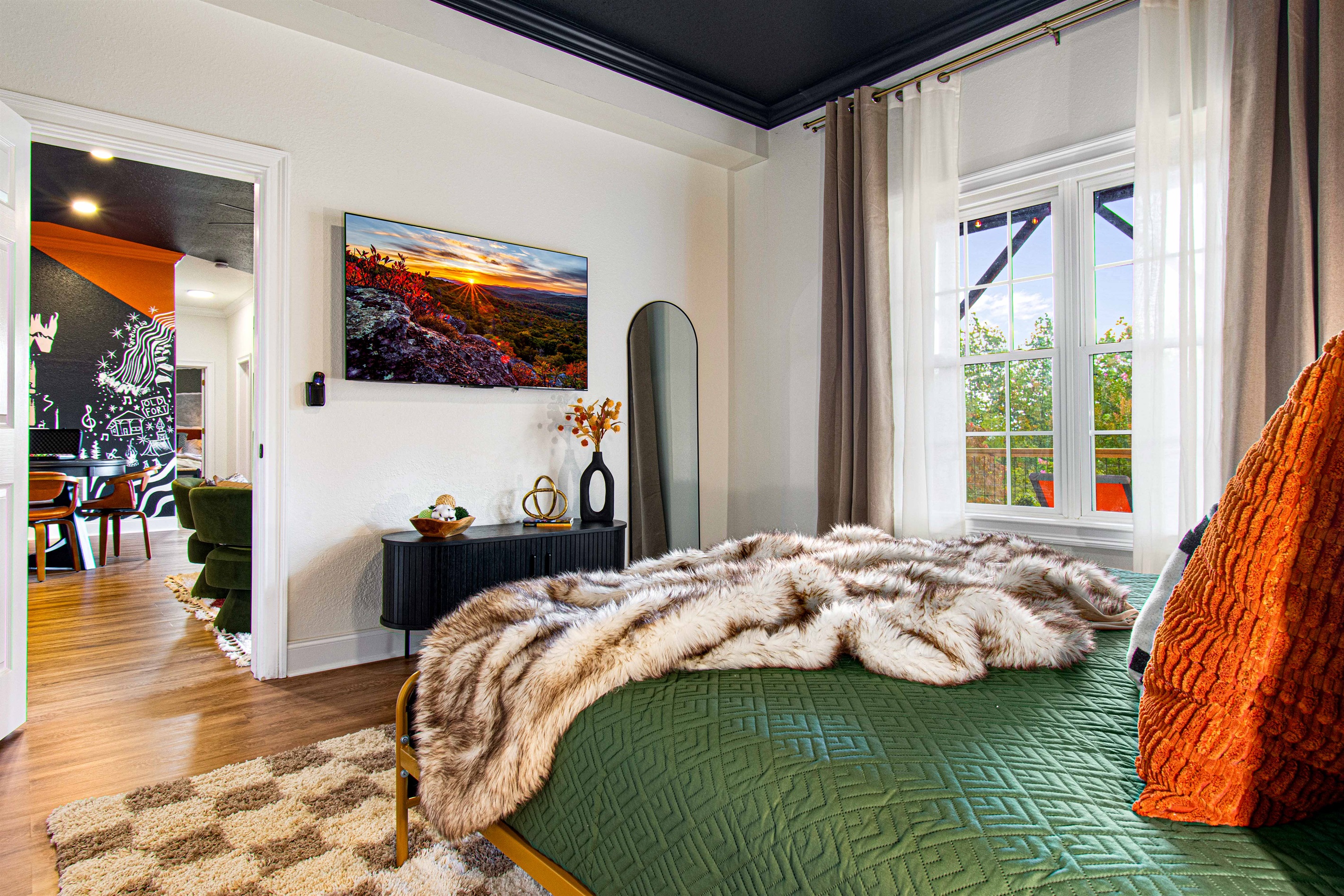 Discover comfort and style in Bedroom 4! 🌿🛏️ Featuring a luxurious king bed, beautifully designed wood panel walls, and a large TV, this room is a perfect getaway. Plus, enjoy the convenience of a brand new bathroom with a modern tiled standing shower. 