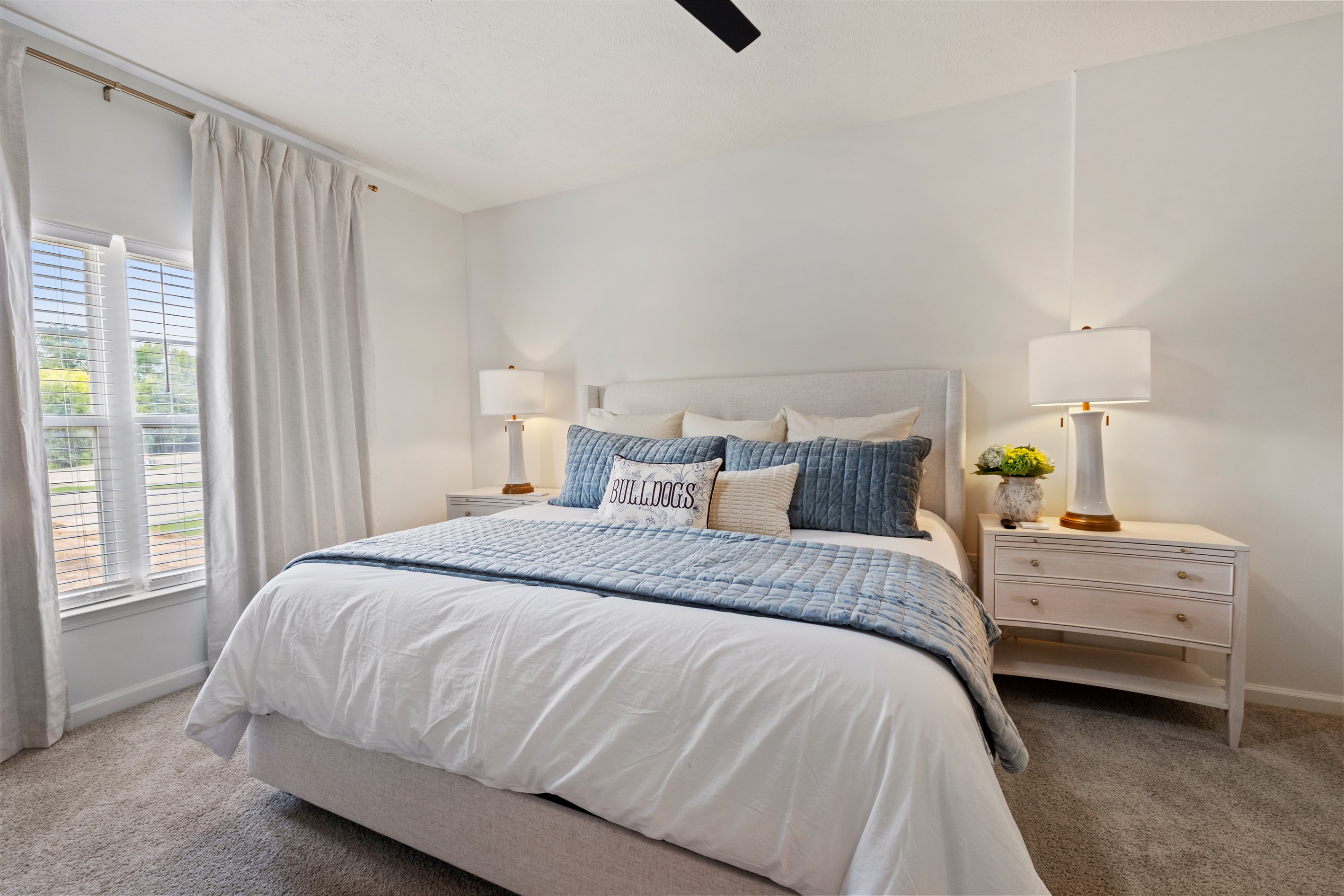 Relax in the master bedroom with a plush king bed, premium linens, and your own TV.