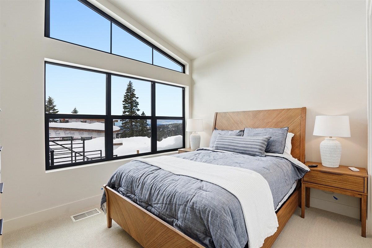Wake Up to Breathtaking Snowy Mountain Views