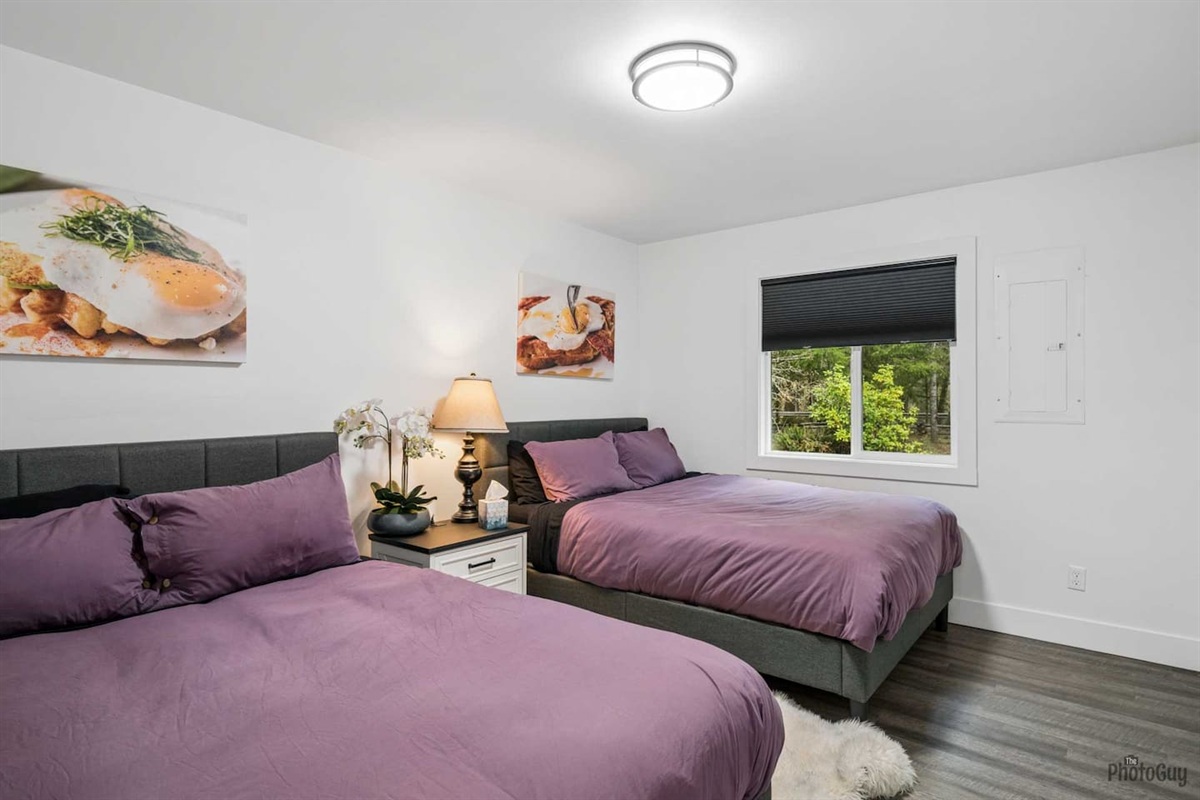 Double queen bedroom with closets