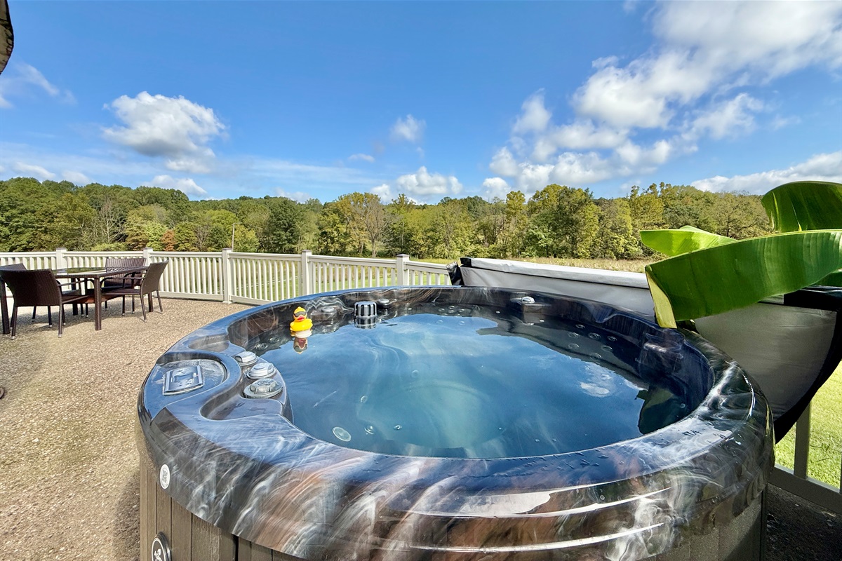 4 person hot tub on site overlooking wheat field