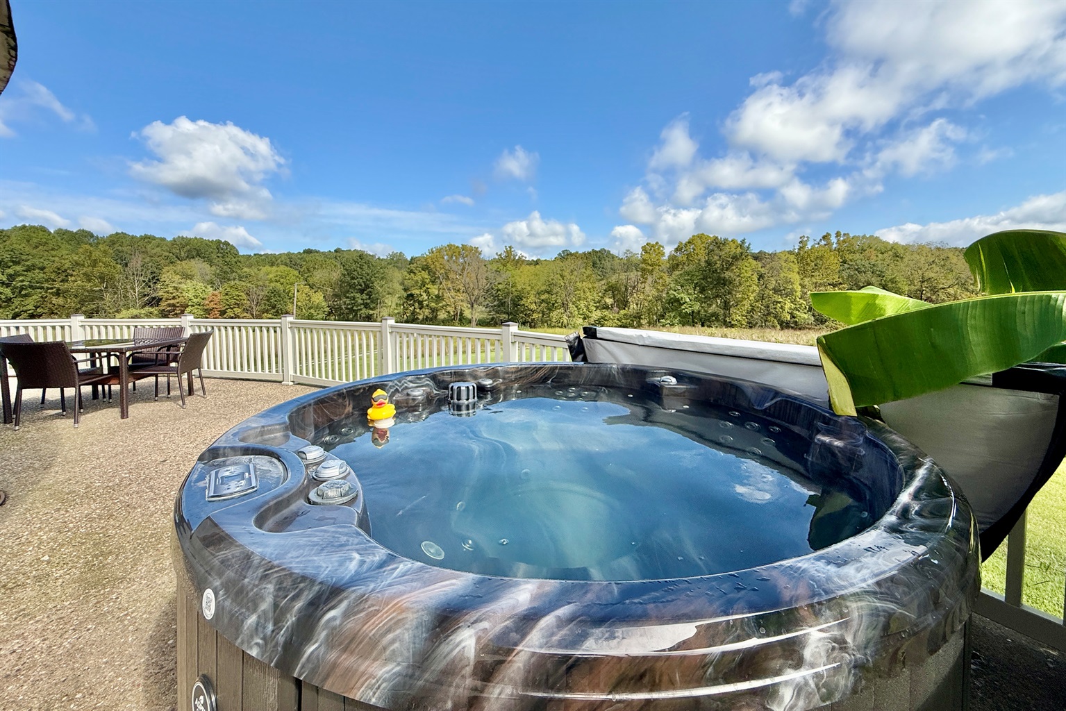 4 person hot tub on site overlooking wheat field
