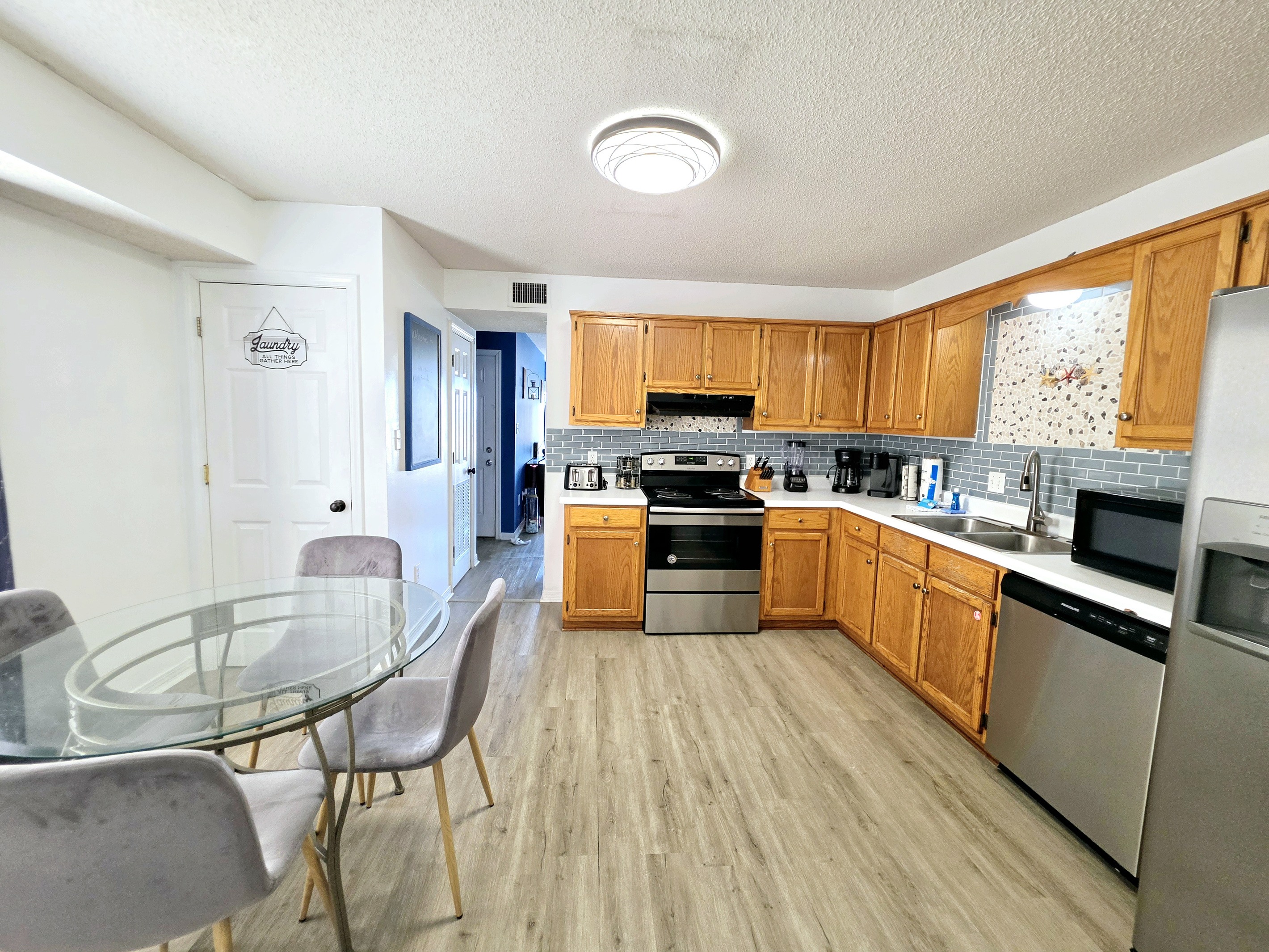 Dining table open to the kitchen