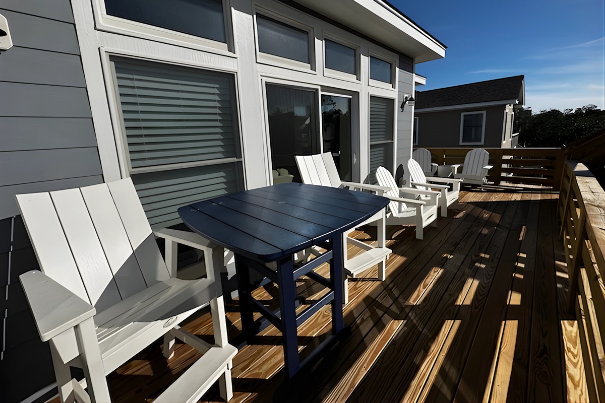 Top-Level back deck with table and seating