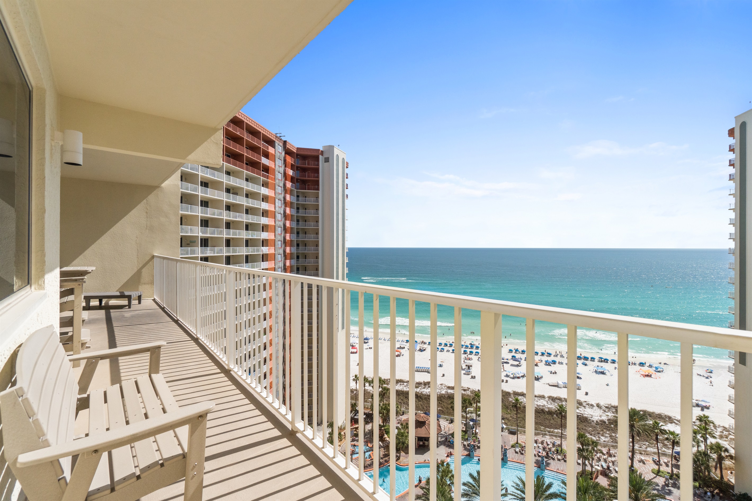 A nice comfy bench for two facing the ocean.