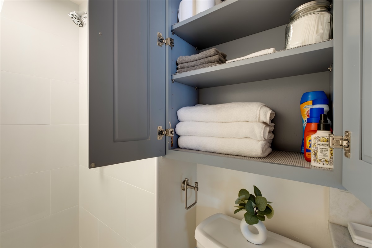 Thoughtfully stocked with fresh linens and essentials, this bathroom is designed for comfort and ease. Every detail — from soft towels to tropical touches — reflects the warmth and hospitality of Waikīkī living.