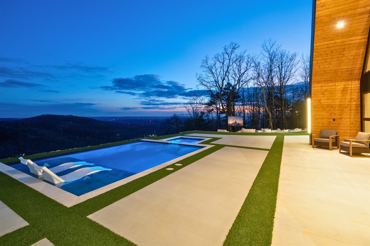 This poolside view is pure relaxation, with clean lines, open space, and the kind of scenery that makes you want to stay out here all day.