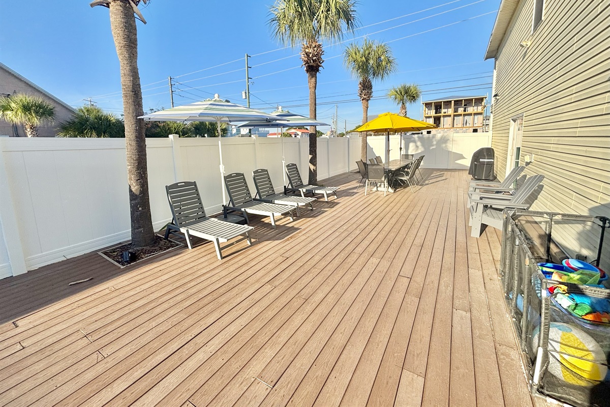 Large deck space with lounge chairs