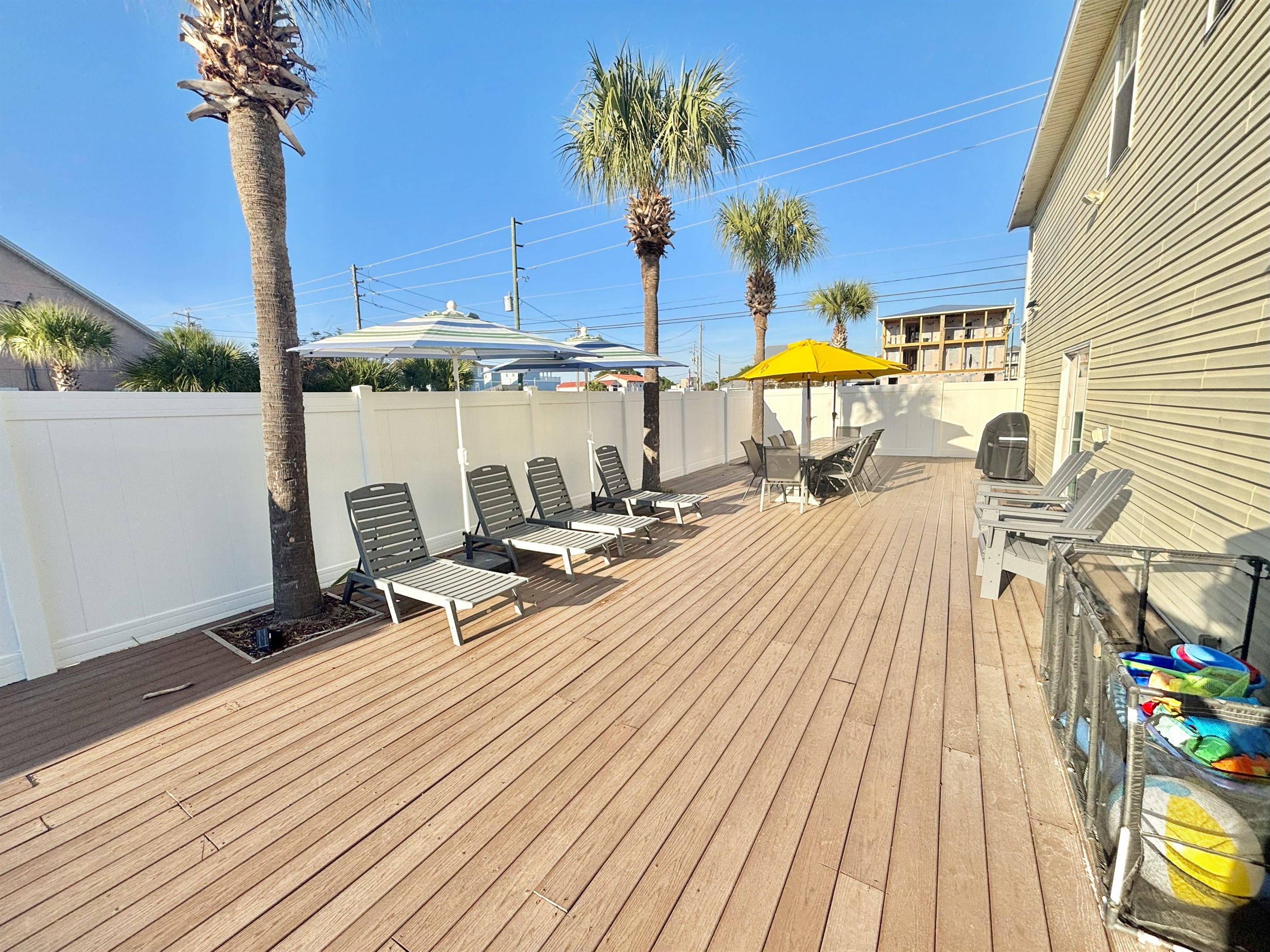 Large deck space with lounge chairs