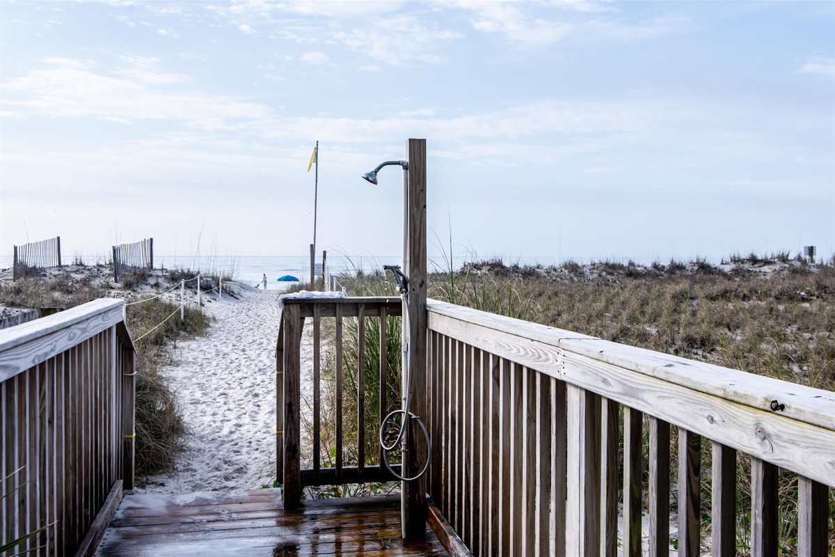 Outdoor Shower - An outdoor shower is provided on the beach side for rinsing off and leaving most of the sand behind.