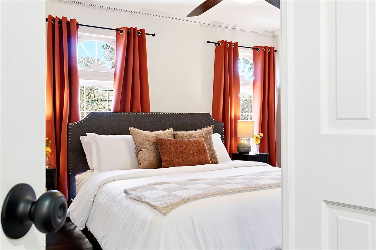 Conveniently located left of the glass front entry, this cozy bedroom offers a king bed and features a smart TV. This room includes 2 full-size towels, 2 hand towels, and 2 washcloths provided for your comfort.