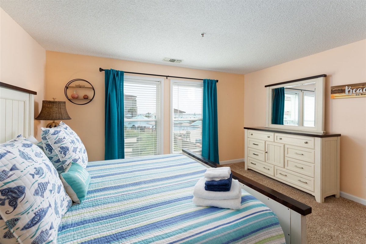 Bedroom 1 offers a peaceful and inviting space