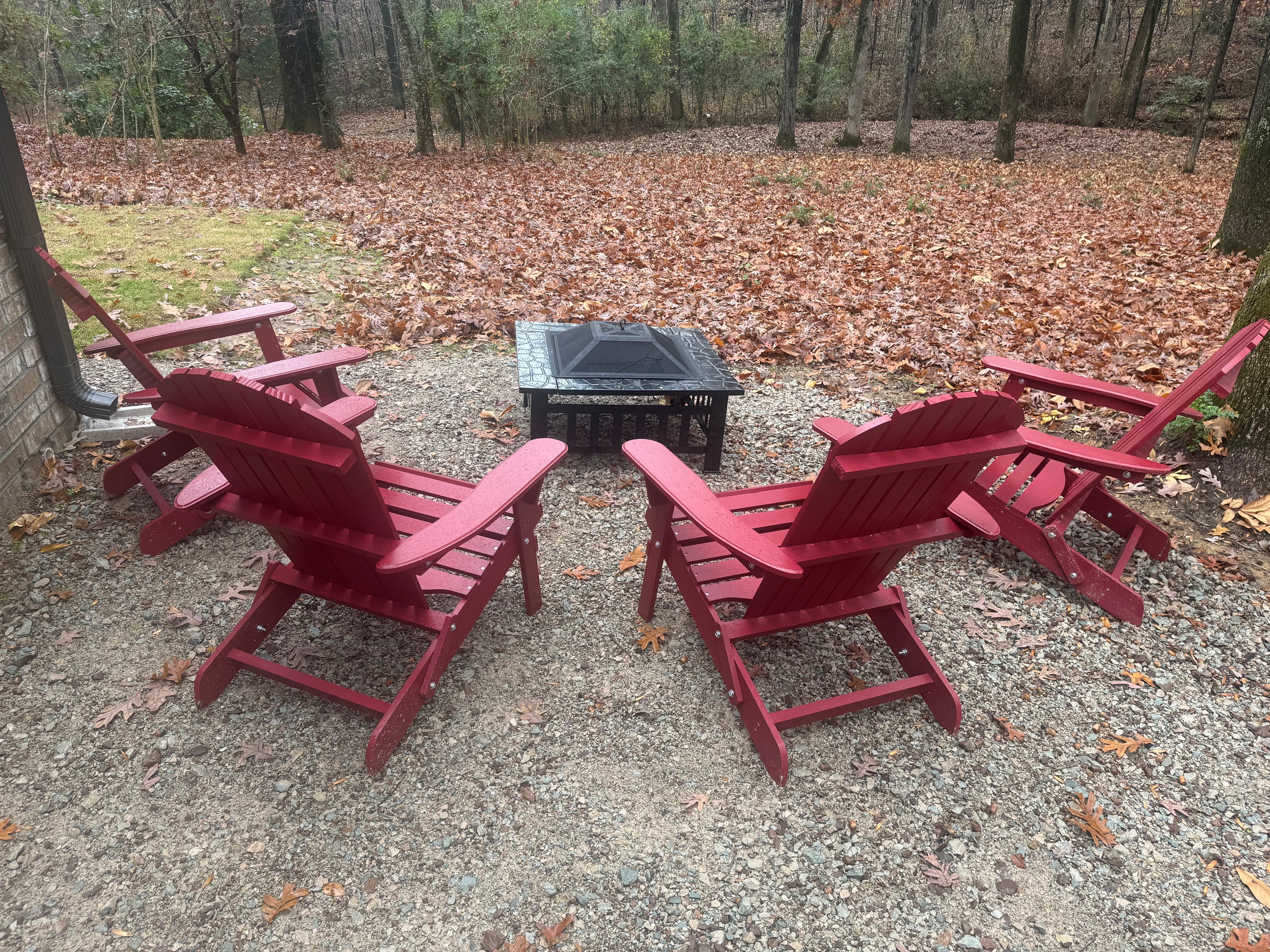 Fire pit with Adirondack chairs