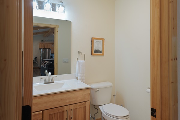 Main floor powder room for guest convenience.