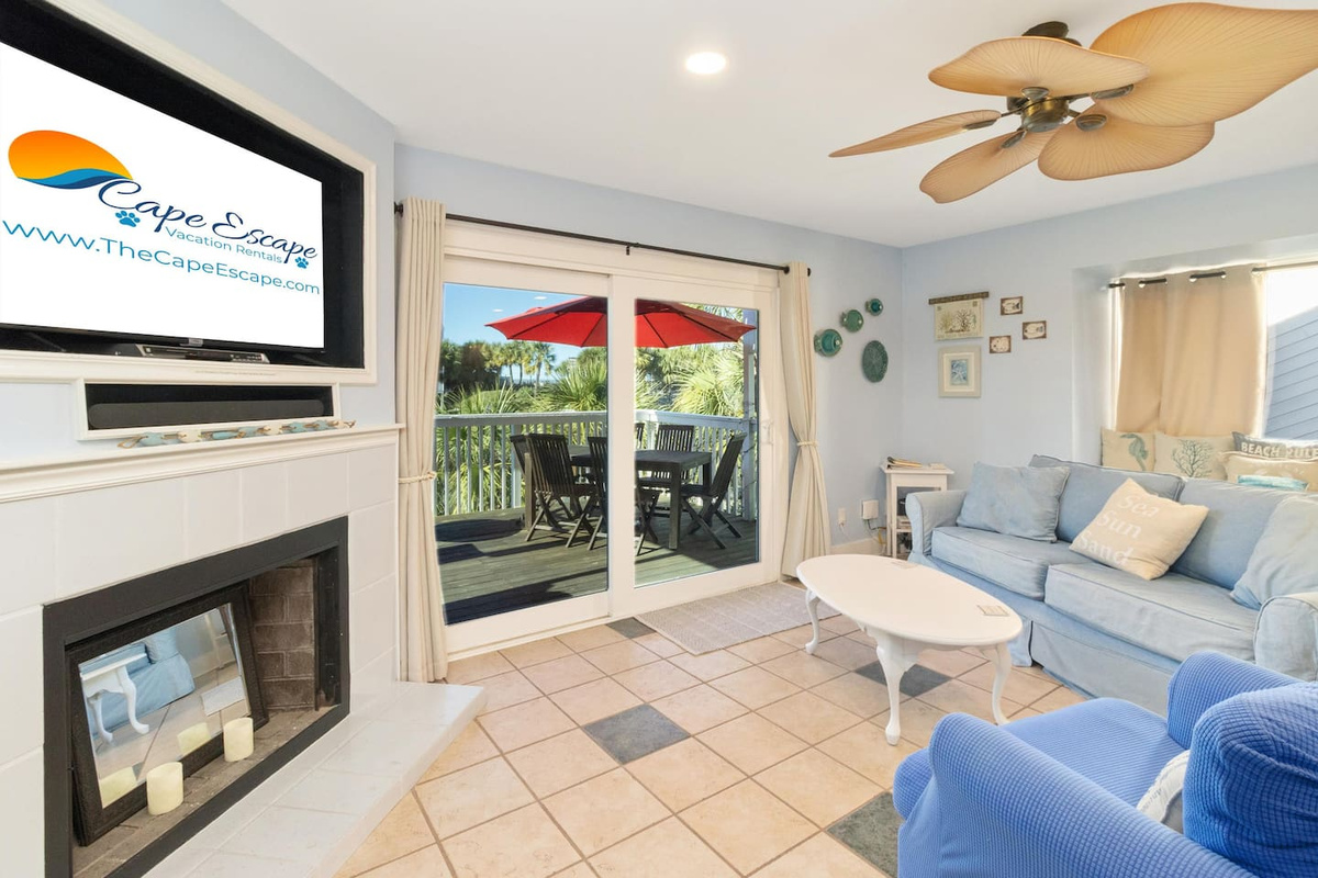 Settle into the main-level living area after a day out &mdash; open, comfortable, and exactly the space a group needs to decompress.