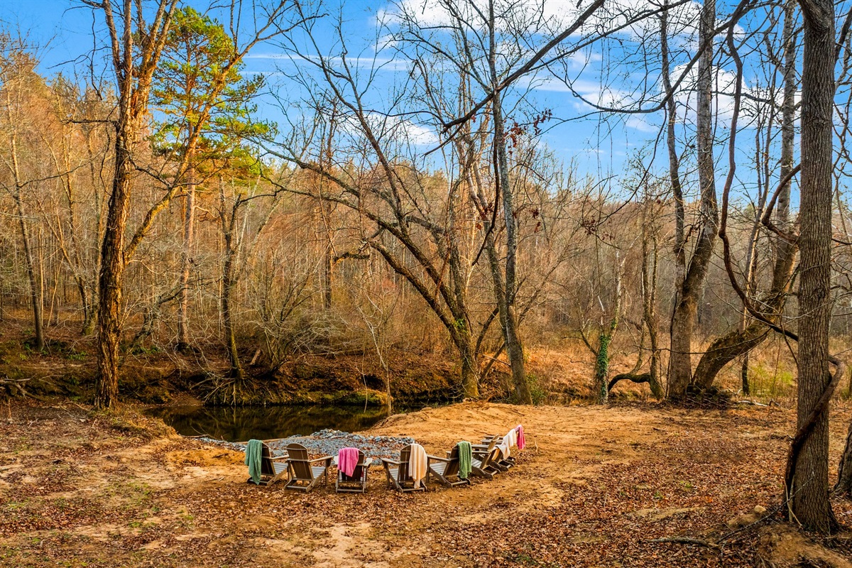 Relax by the river in provided chairs and enjoy the moment. 