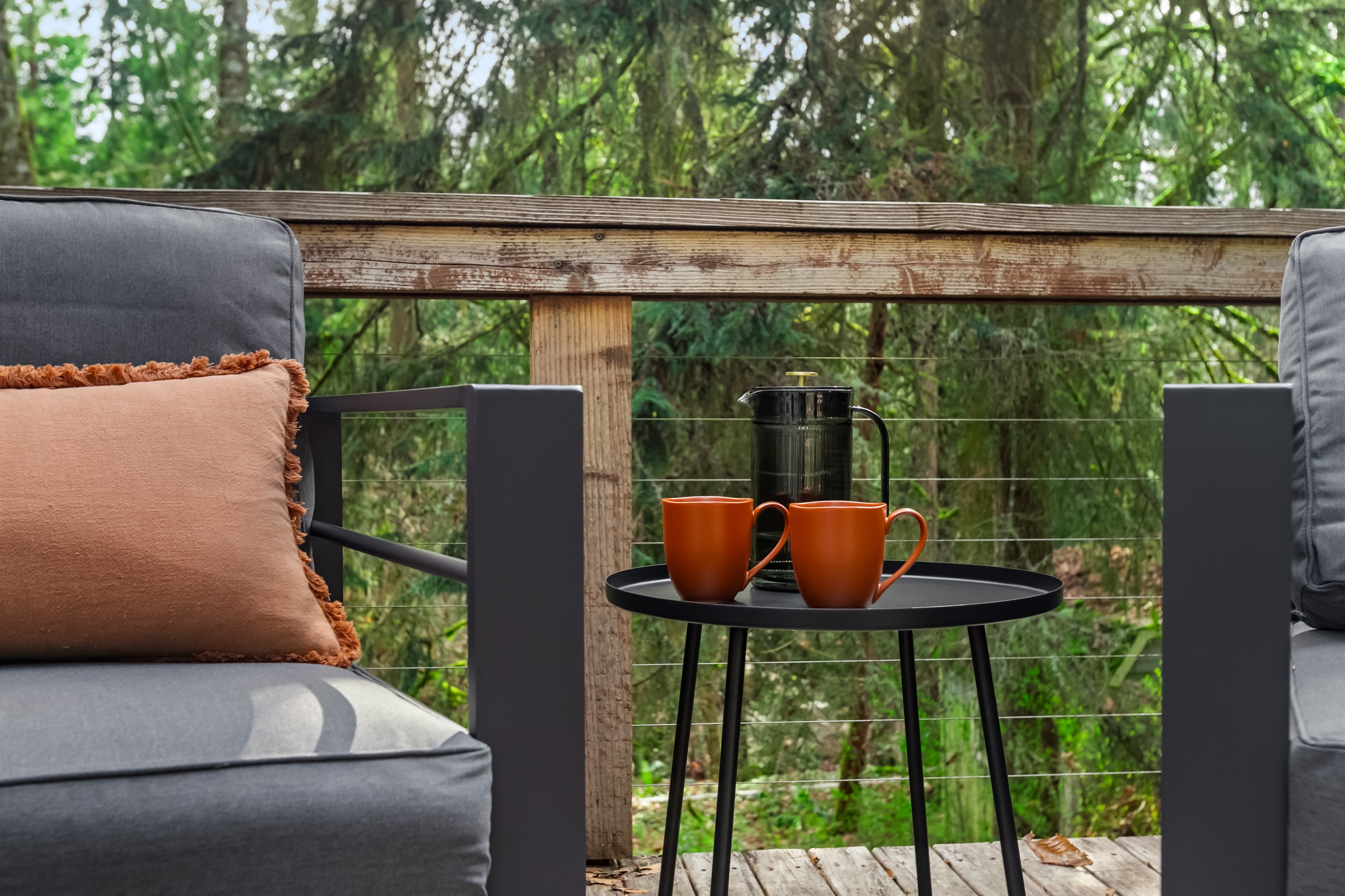 Secluded seating areas on the outside deck provide great spots for your morning coffee outside the primary suite.
