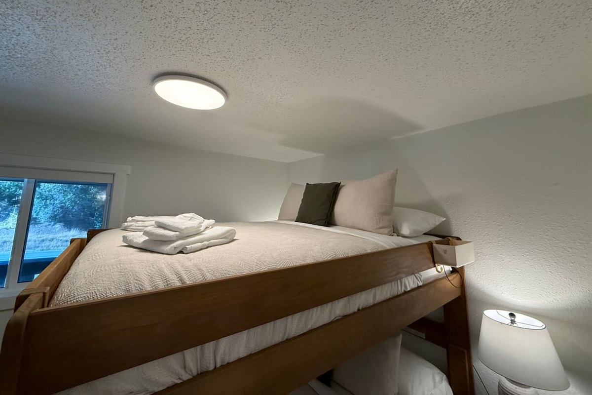 Enjoy comfortable sleeping in the top bunk, designed for a restful night's sleep in a compact, efficient space.
