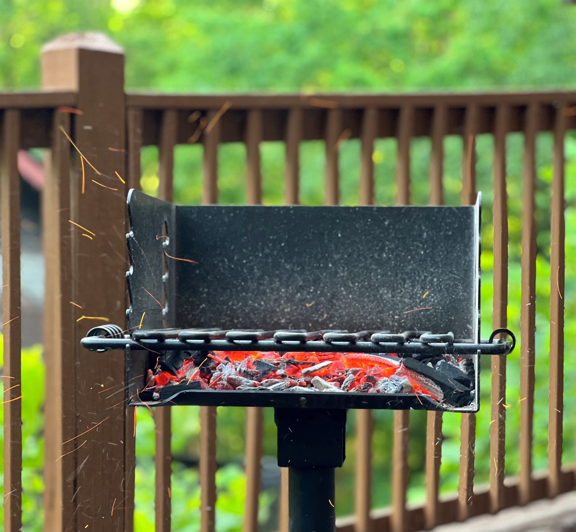 Outdoor charcoal grill