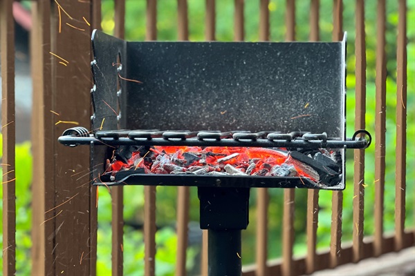 Outdoor charcoal grill