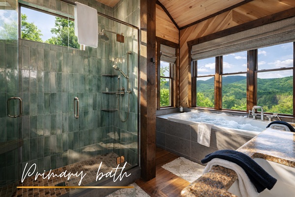 Refresh in this beautifully tiled bathroom, featuring a walk-in shower and plenty of natural light.