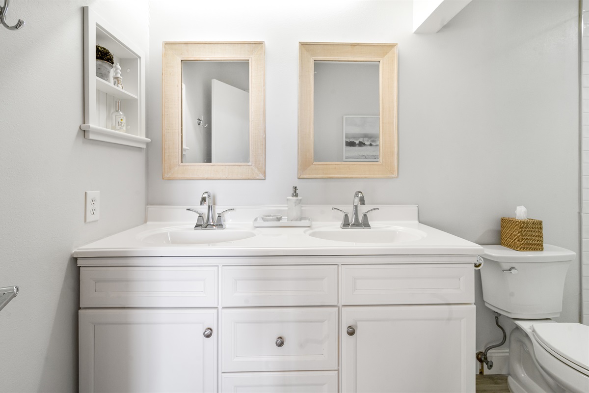 Attached to the main bedroom, this en-suite bathroom offers a clean, spacious layout with fresh towels and thoughtful touches.
