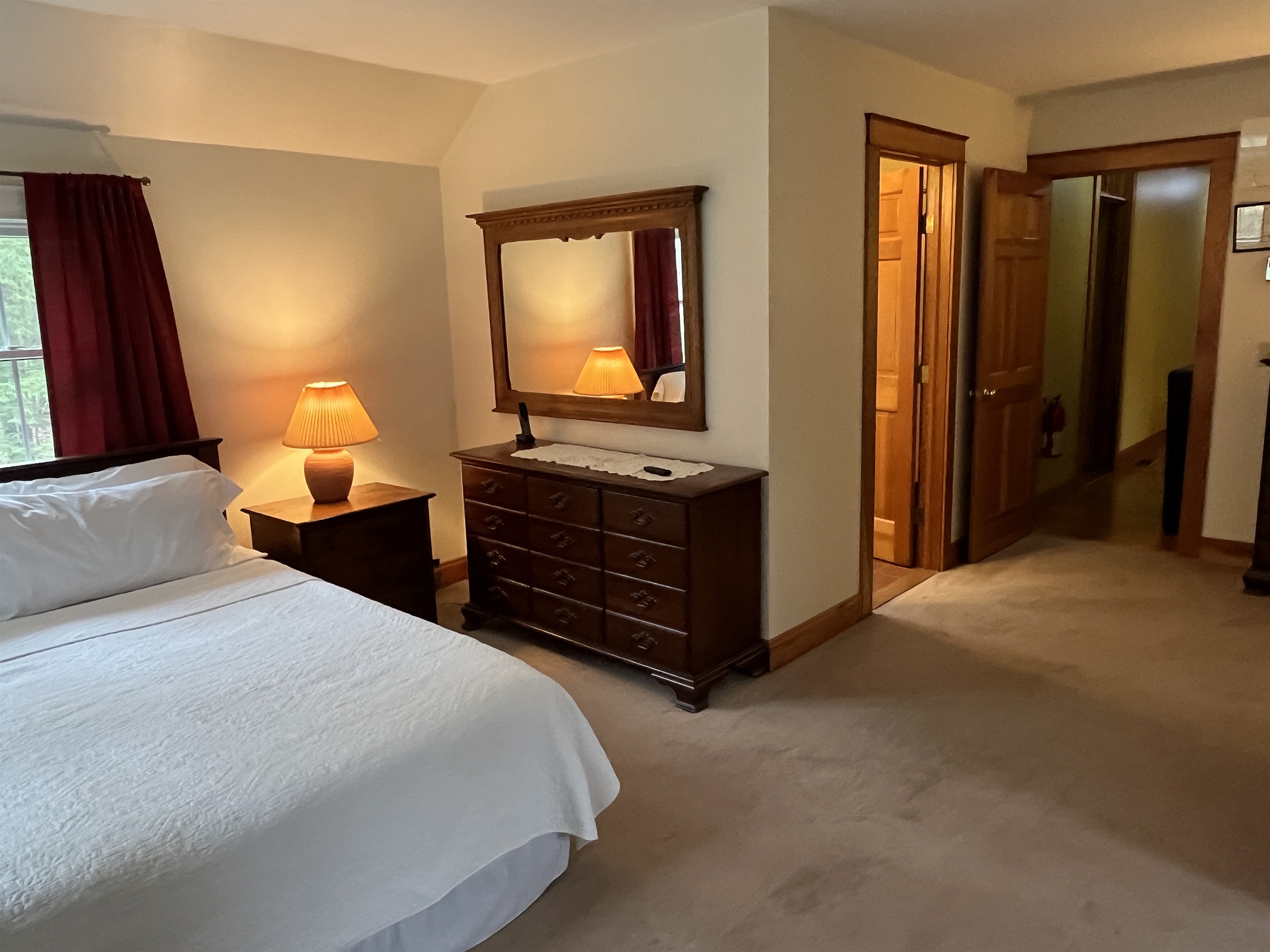 King primary bedroom with ensuite bath