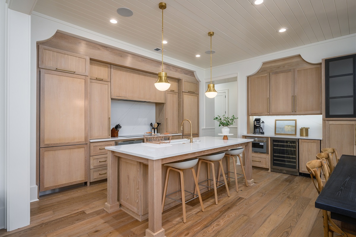 Kitchen features a coffee bar and wine fridge
