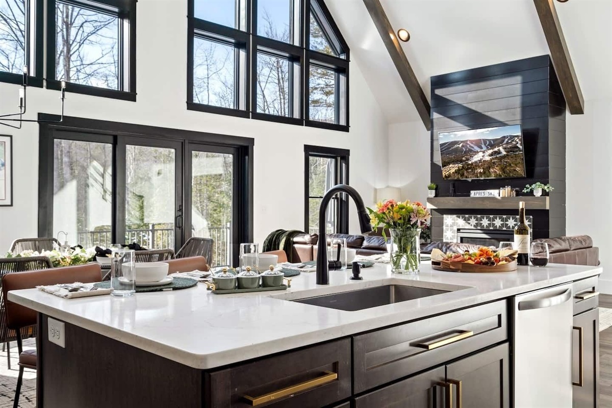 Kitchen island mornings, fireside evenings, and views that steal the show. Whether you're gathering, grazing, or Zooming with a view—this is Sunday Basecamp at its most lived-in and loved.