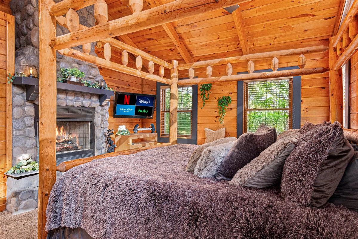 Huge canopy king bed, huge fireplace, 2 streaming TV's.