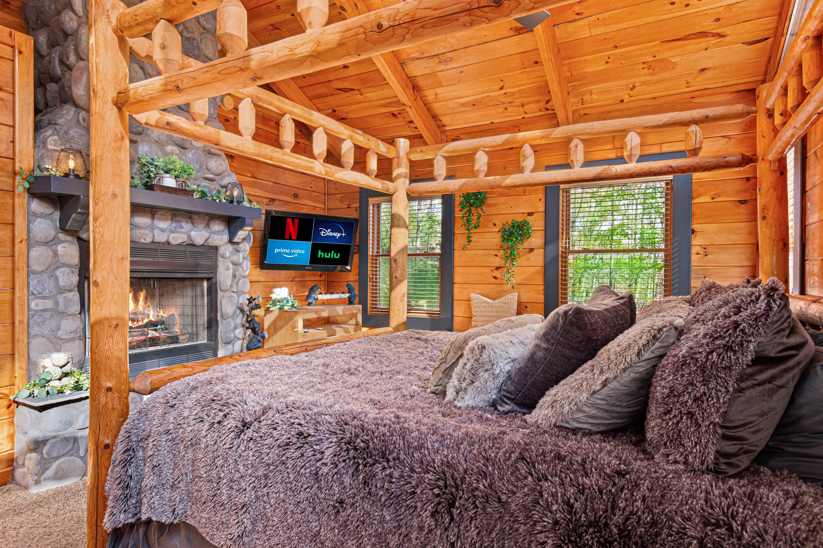 Huge canopy king bed, huge fireplace, 2 streaming TV's.