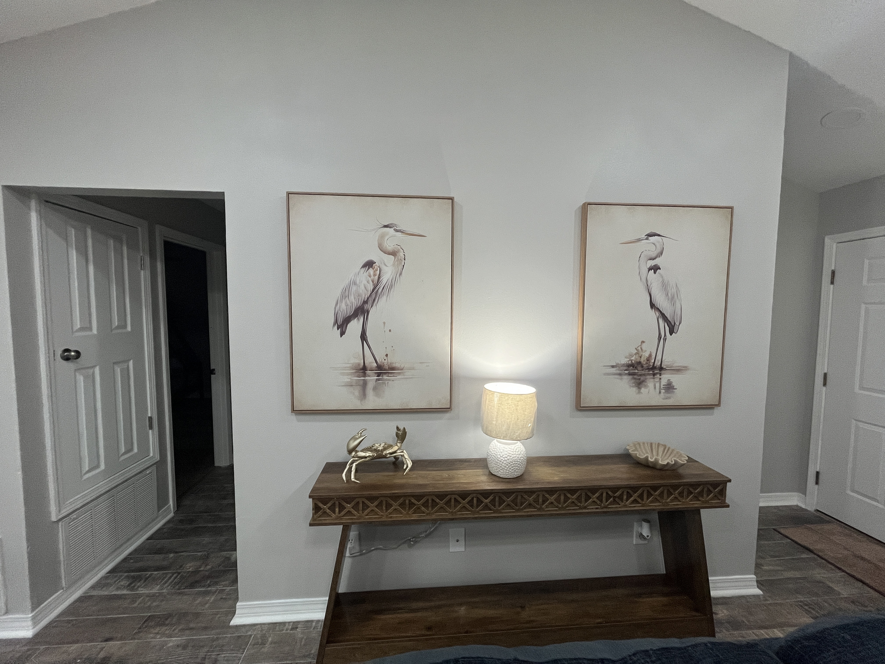 Coastal artwork brings the beach vibe home.