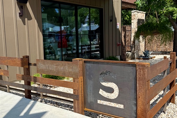 Hill Country stone signage at Gaines Ranch &mdash; your way in to Cutter's Quarters.
