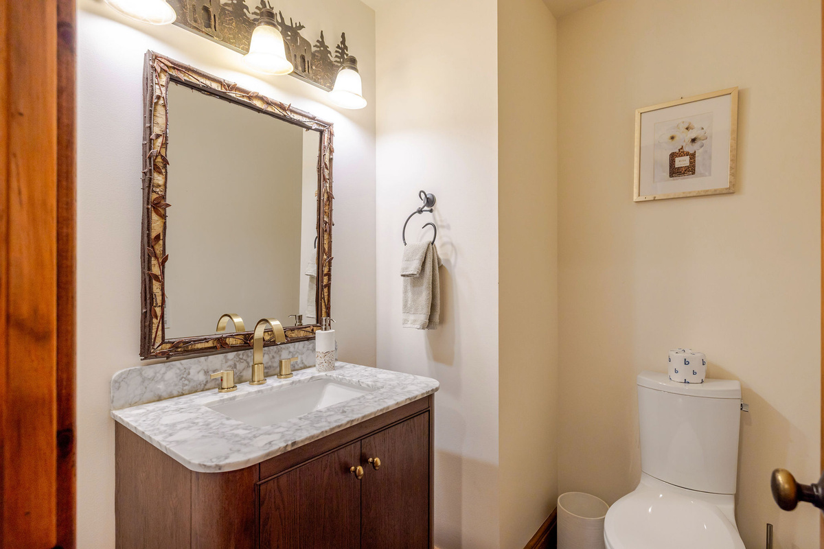 Main floor half bath conveniently located just off the main living area.