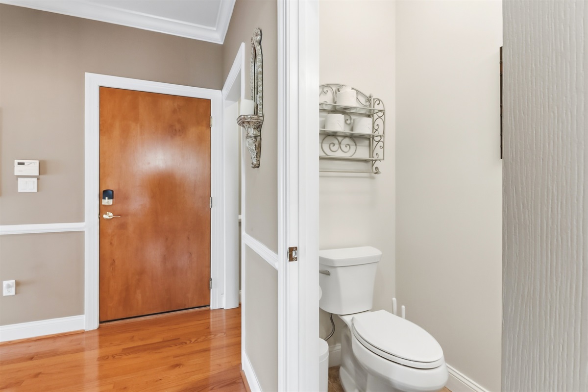 Half bathroom by the hallway