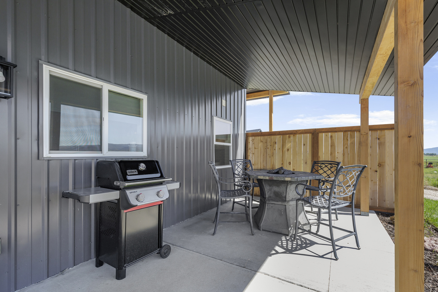 Outdoor patio outside the entrance of the home.