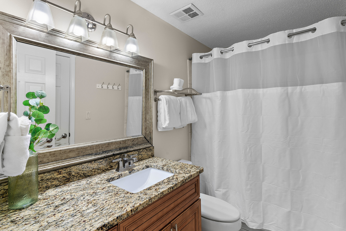 Shared Bathroom with Shower/Tub Combo 