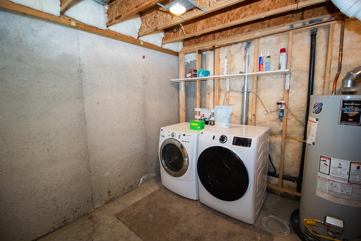 Brand new laundry units, supplied with laundry detergent, fabric softener sheets, iron, and board
