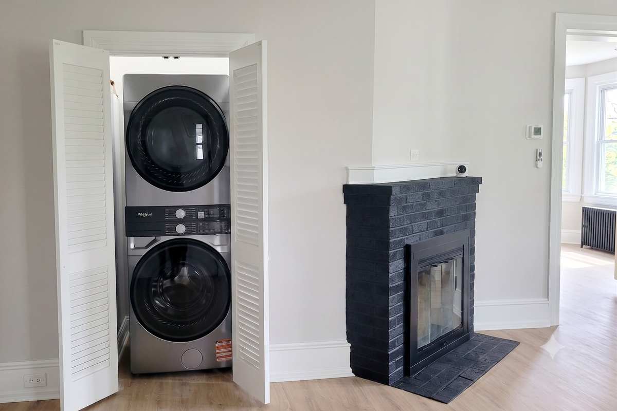 Real wood fireplace and in-unit laundry provide all the conveniences of home.