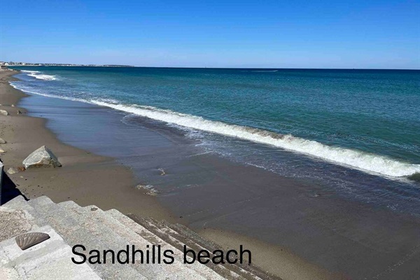 Beautiful Sandhills beach.  Easy ~5 minute walk/stroll from the house, no need to drive . Photo taken during off season (April) and high tide. 