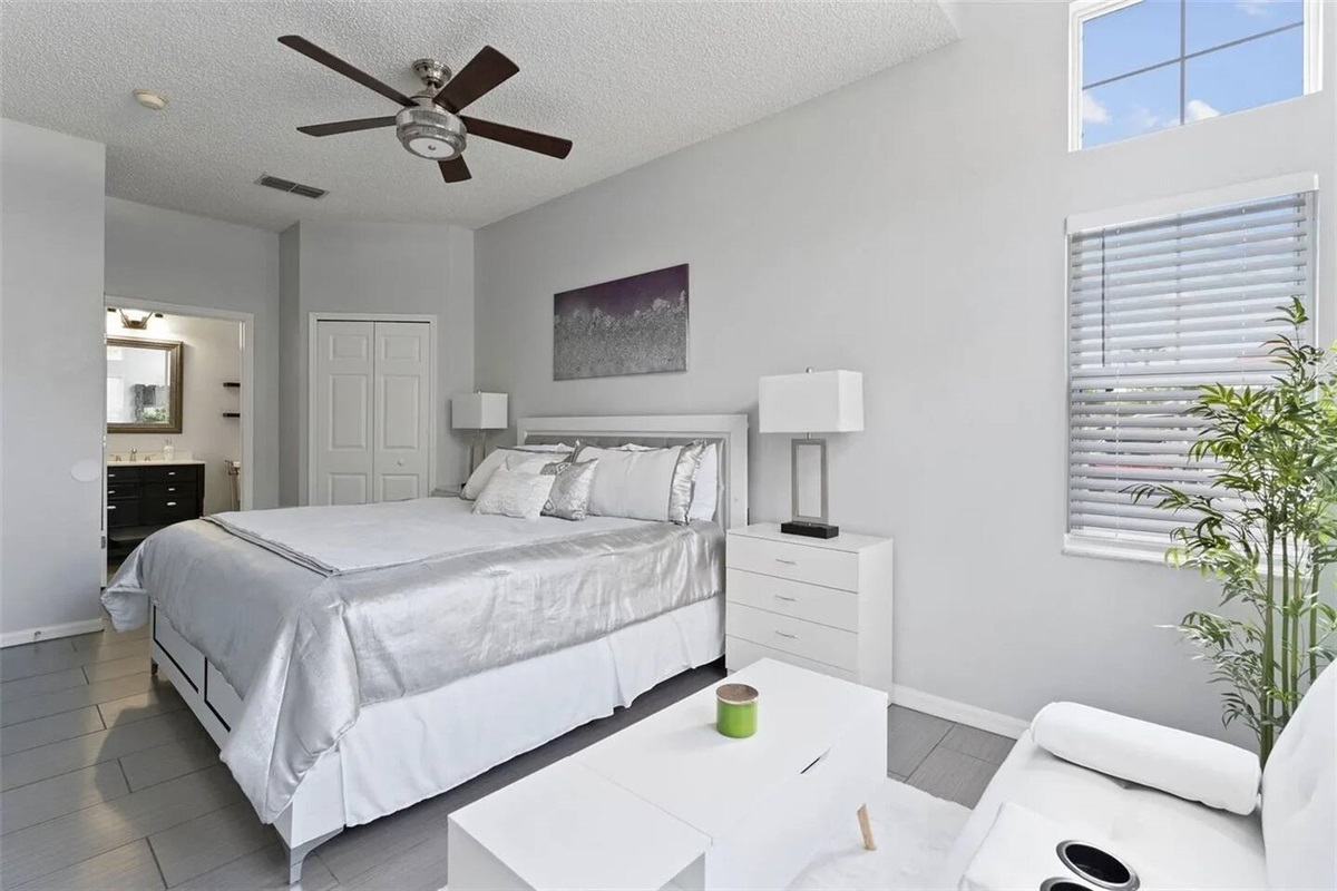 It has a lovely bright light, a private ensuite full bathroom, and its own TV. It also has a comfortable sofa.