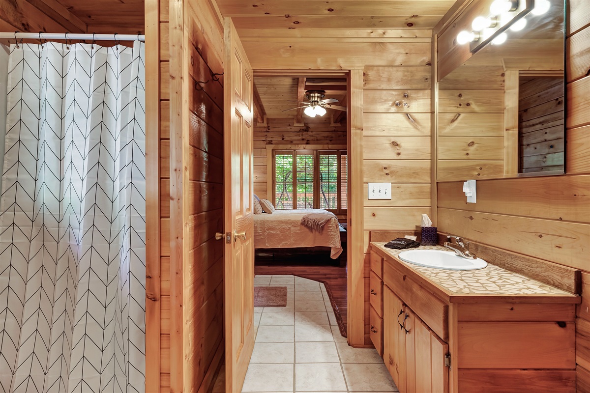 Stall size shower with shampoo and body wash included. Just inside the bedroom, you'll find a jetted tub as well.