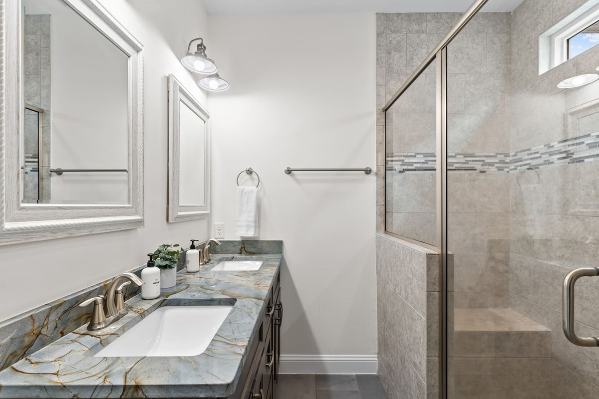 En Suite - Dual Sinks - Walk In Shower.