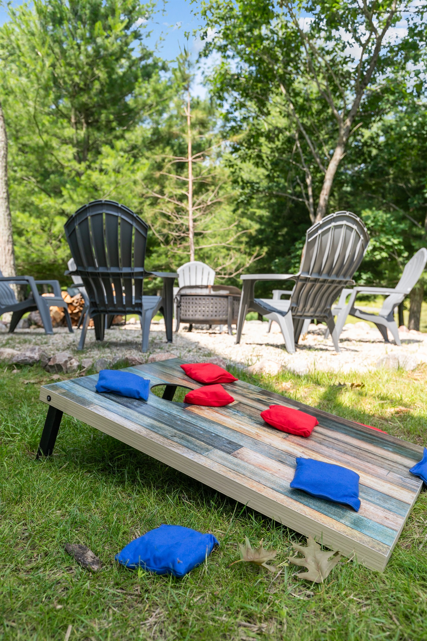 Enjoy a laid-back game of cornhole in the backyard—perfect for some friendly competition while soaking up the lake vibes.