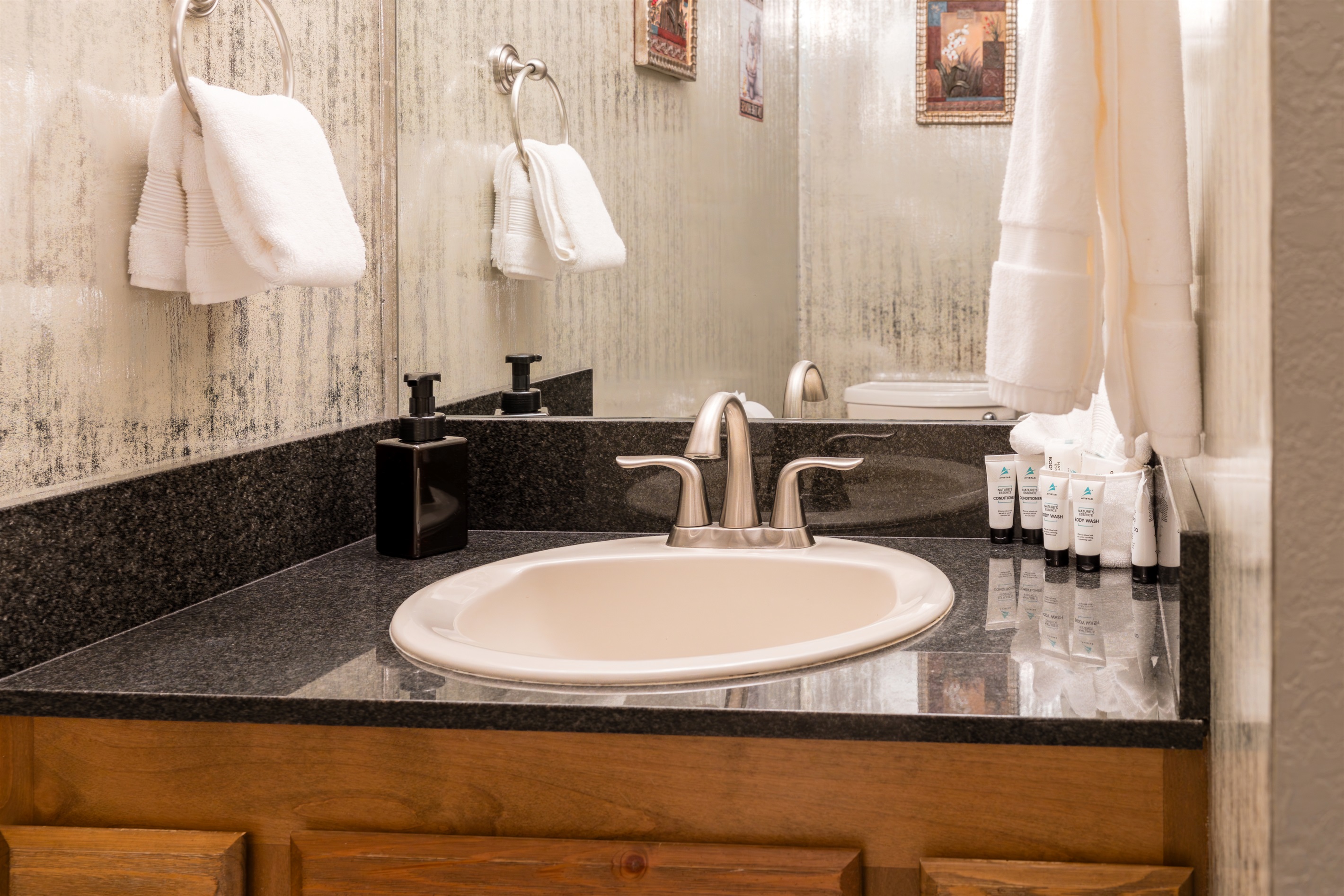 Basement bathroom with towels and soaps for your stay.
