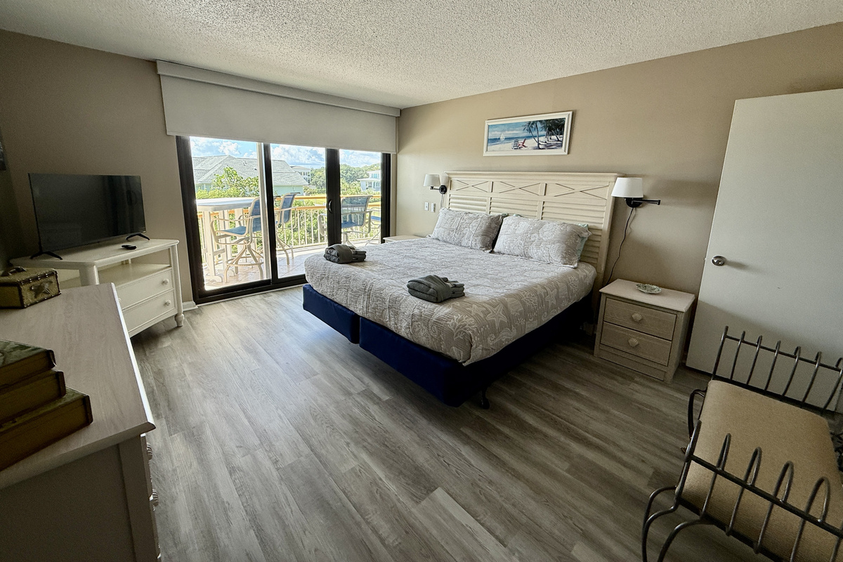 Primary Bedroom w/LVT Flooring and Smart TV