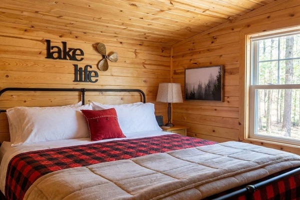 Upstairs you’ll find a second king bedroom with cozy cabin details and a Roku Smart TV, ideal for unwinding in comfort and privacy. King Bed - Upper Level, Bedroom 3 