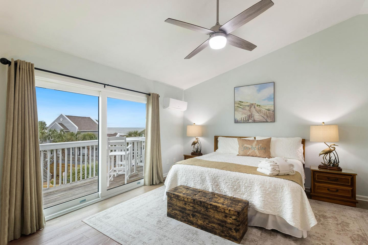 Sleep here, wake here, step straight onto the private sunset deck &mdash; the top-floor suite you booked this for.